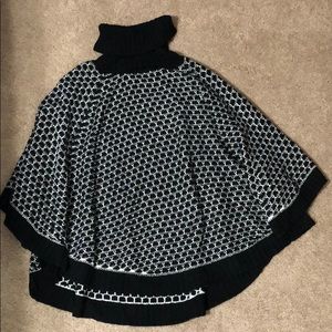 3/$10 Black and white poncho size S